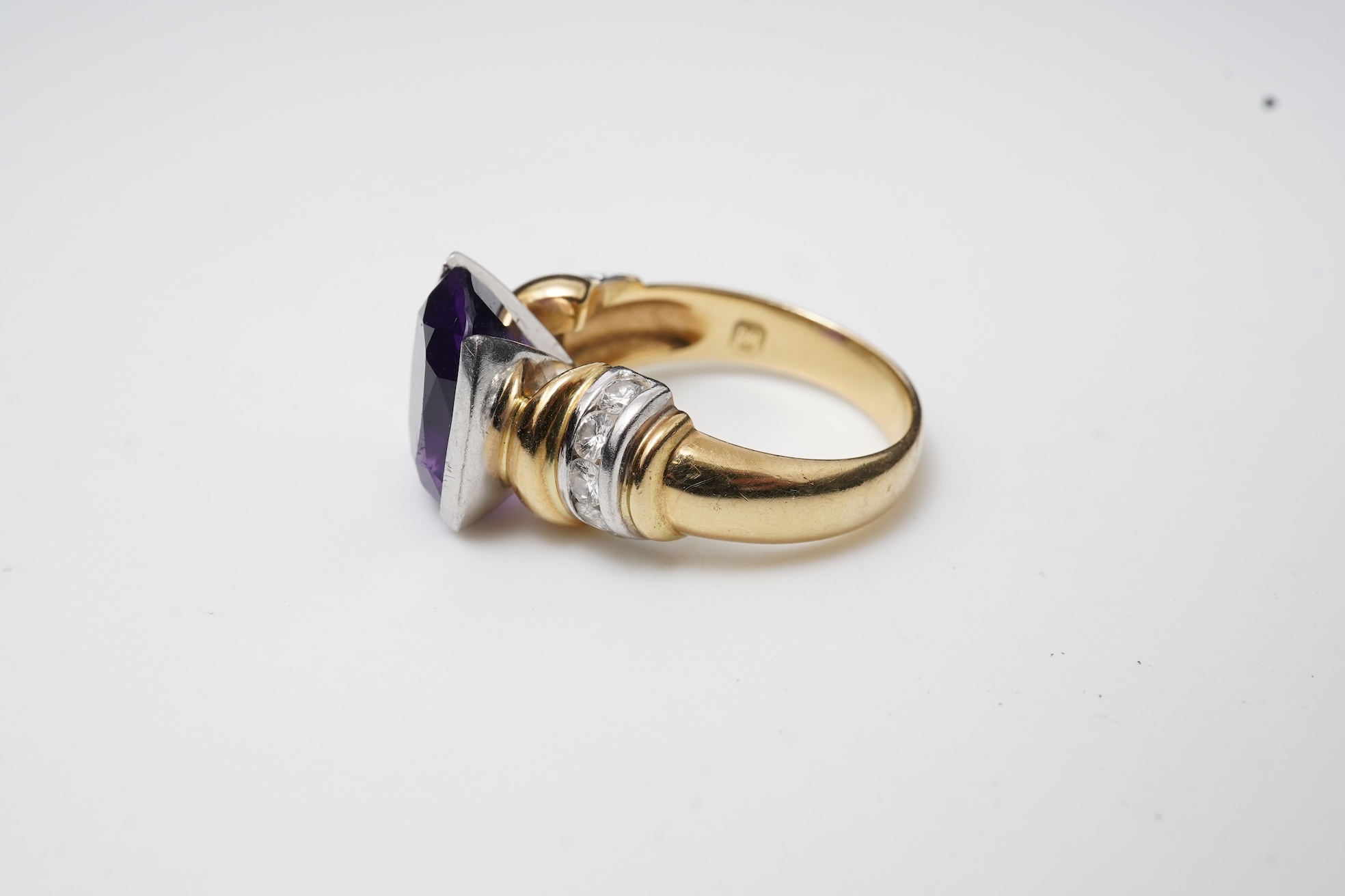 An amethyst and diamond ring